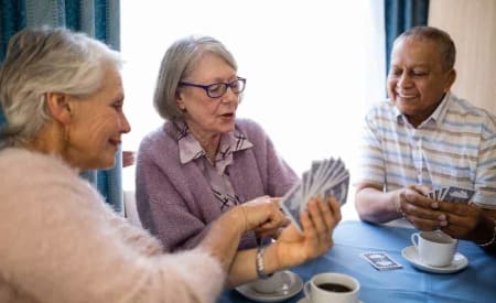 active seniors playing cards